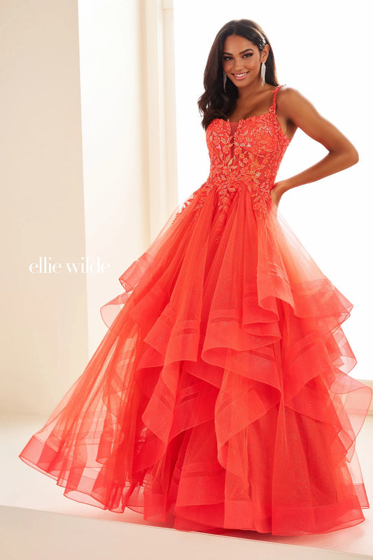 Expertly crafted by Ellie Wilde, the EW36035 dress boasts a sheer lace shimmer, ruffle details, and a corset-style bodice. Completed with a sequin layer for added sparkle, this ballgown will make you stand out at any prom or formal event. Elevate your style and confidence with this stunning dress.