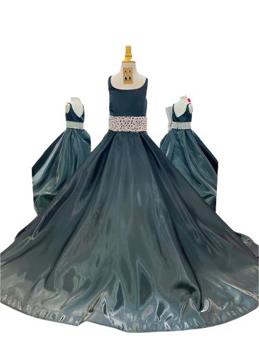 Indulge in luxury and sophistication with the Ashley Lauren 8276 Girls Satin Ballgown. This exquisite piece features a beautiful satin fabric that flows effortlessly, while the embellished crystal waistline adds a touch of glamour. Perfect for your little princess, this ballgown will make her feel like royalty.