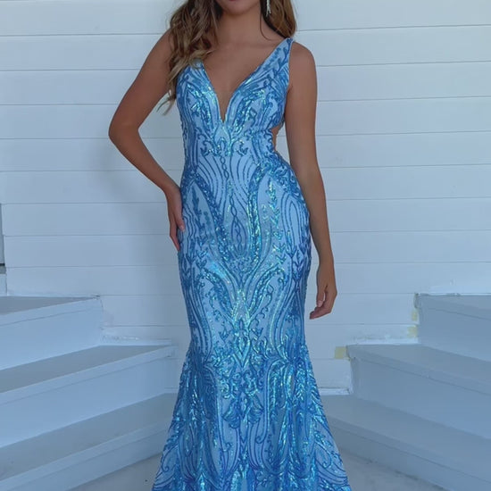 This elegant Ava Presley 39204 long prom dress is a perfect choice for any formal occasion. The fitted mermaid silhouette and plunging v neckline create a sophisticated and flattering look. Made with high-quality materials, it offers both comfort and style. You'll feel confident and stunning in this formal pageant gown.