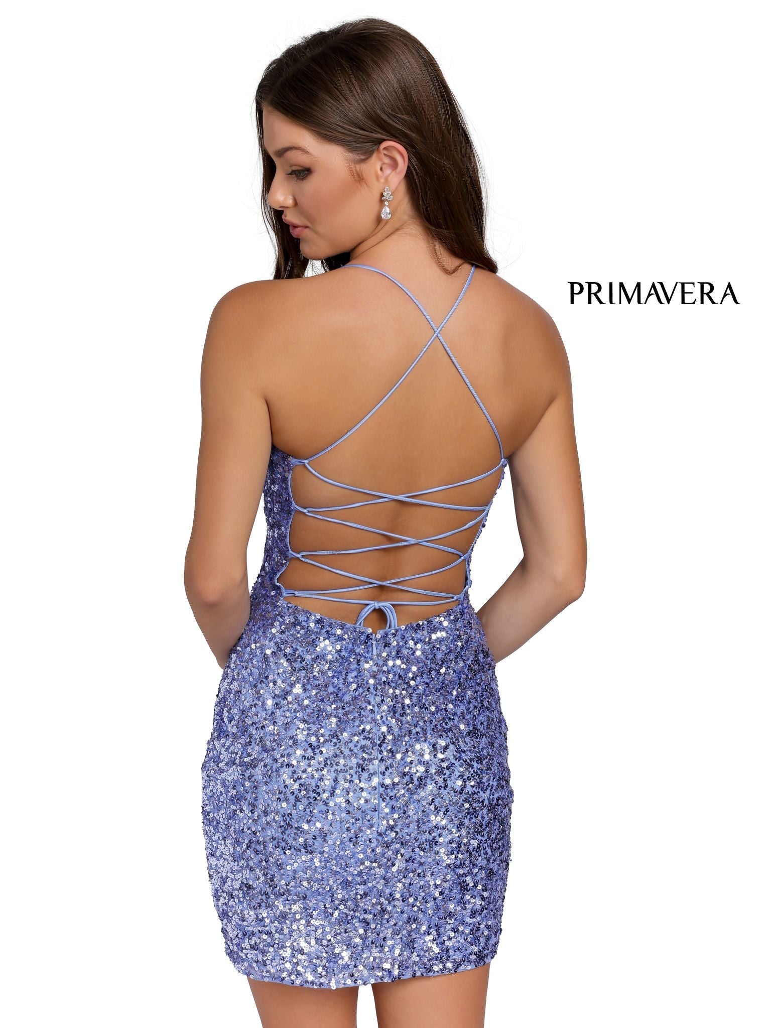 Primavera 3351 is a short fitted sequin embellished cocktail dress. This gown would be perfect for homecoming, dances & Formal events. Scoop neckline with spaghetti straps wrapping around to an open back with a lace up corset tie. This backless dress features multi Red & Textured sequins for Tons of Dimension!