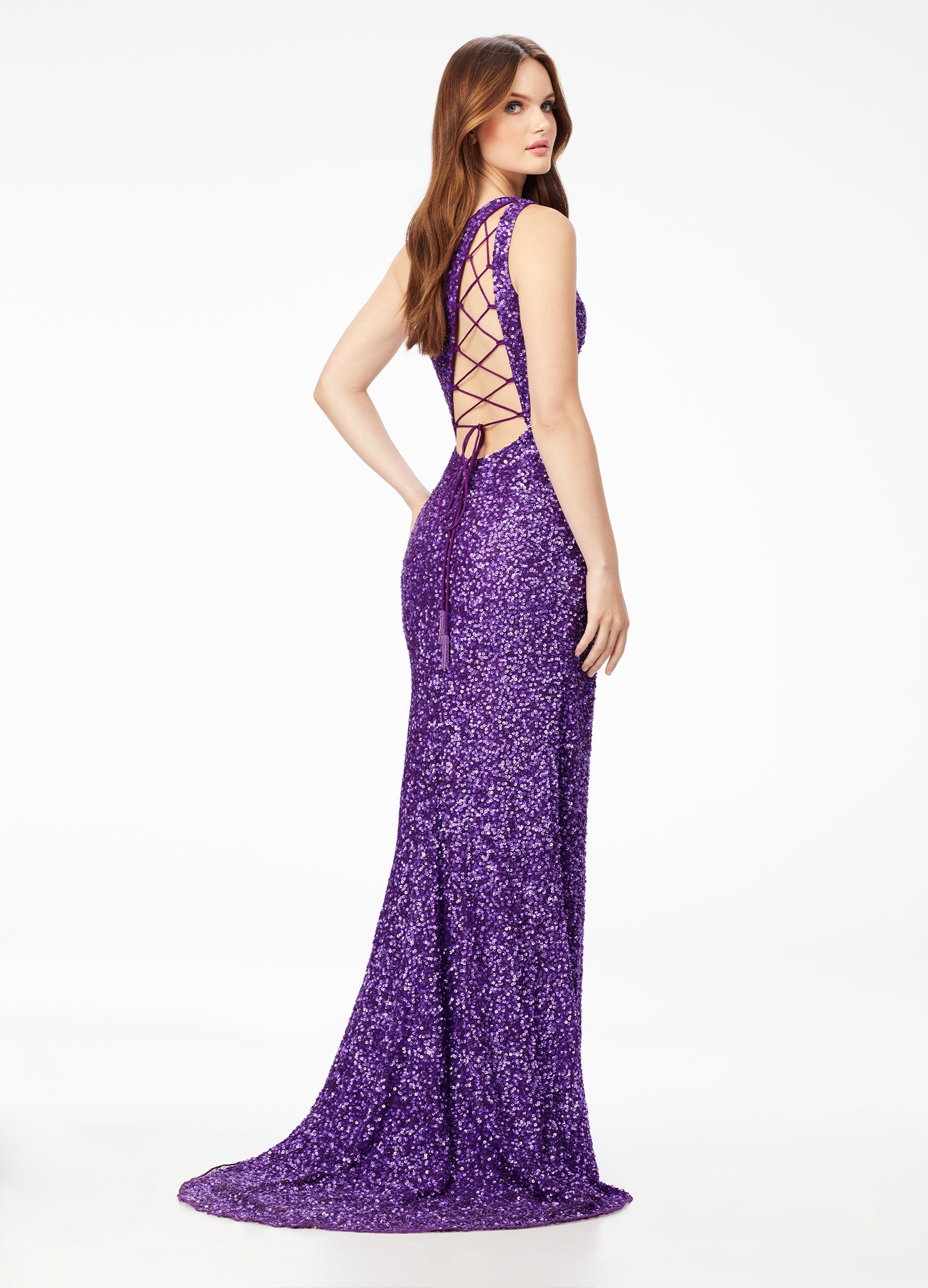 Ashley Lauren 11144 Sequin One Shoulder Prom Dress with Lace up Back  Dazzle the night away in this one shoulder sequin gown featuring an asymmetrical lace up back and left leg slit.