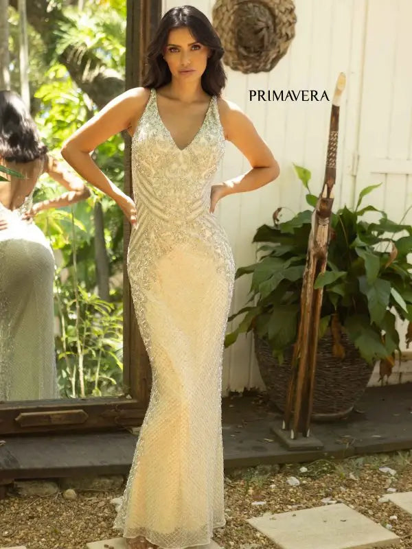 Primavera Couture 12063 Prom Dress Long Beaded Dress. This Gown has some beautiful design on it. Also has an open back. 