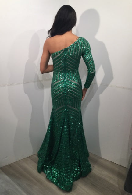 Jovani 24098 One Shoulder Long Sleeve Fitted Sequin Mermaid Prom Dress Pageant Gown Jovani 24098 is the perfect choice for a special occasion. It features a one-shoulder neckline, long sleeves, and a mermaid silhouette adorned with fantasy sequins. This fitted gown is designed to flatter, making you look and feel amazing.  Sizes: 00-24  Colors: EMERALD, IREDENSCNT BLUE, IRIDESCENT VIOLET, NEON HOTPINK, PEACOCK