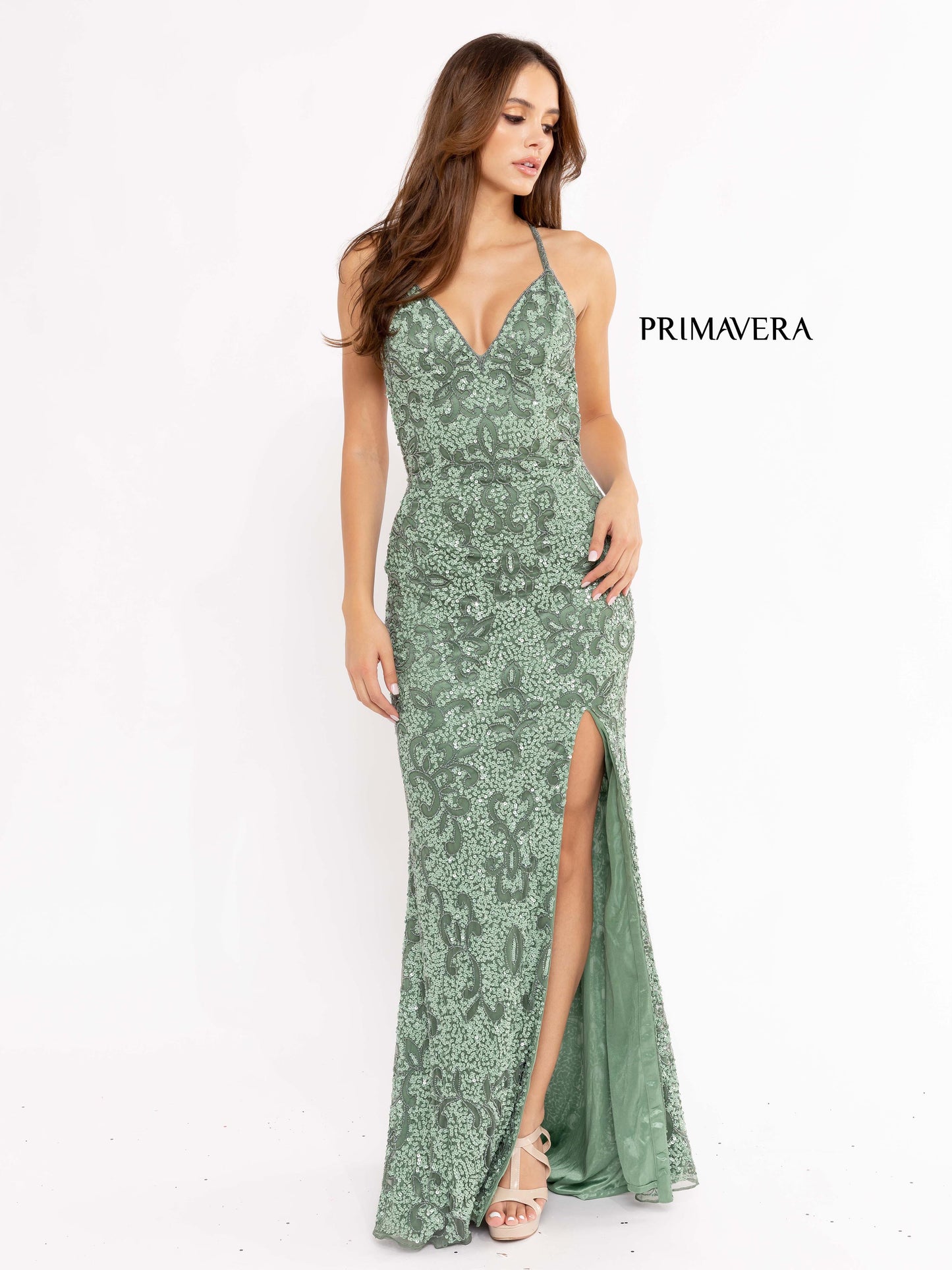 Primavera Couture 3295 Exclusive  Prom Dress, Formal Evening Gown.  This exclusive prom dress is designed with sequins throughout.  I has a V neckline with beaded spaghetti straps that crisscross in the open back.  It is long with a left side slit.  Available Colors:  FUSHIA,CREAM,EMERALD,IVORY,PEACOCK,BLACK,MIDNIGHT,NEON LILAC,NEON PINK,FORREST GREEN,PURPLE,TURQUOISE,CORAL,BLUE,RED,LIGHT BLUE,NEON SAGE