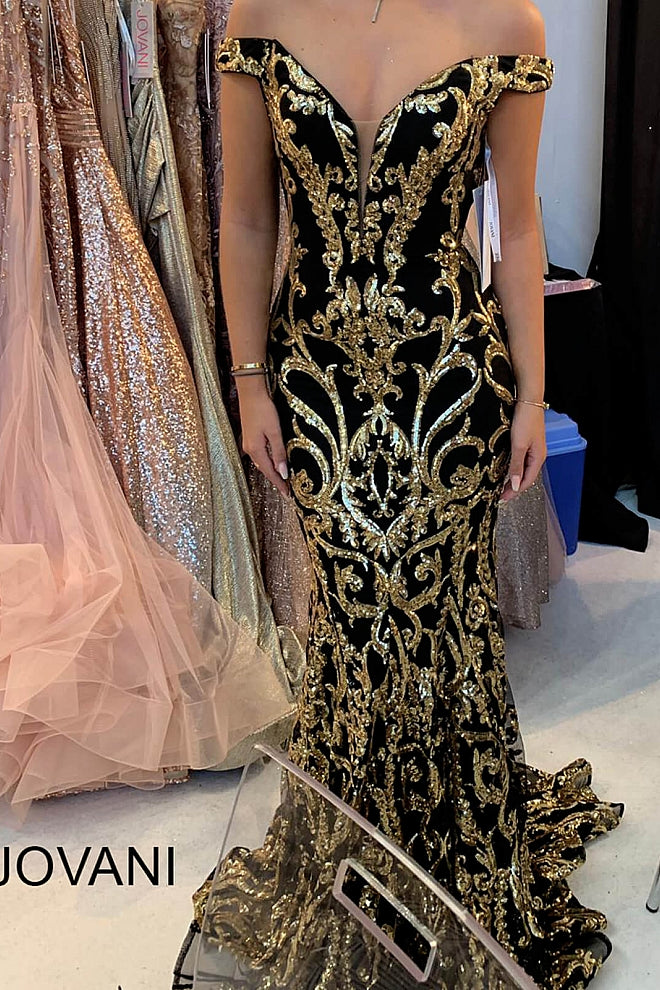 Jovani black and 2024 gold prom dress